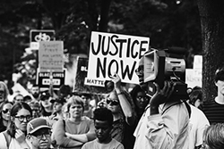 protestors with signs